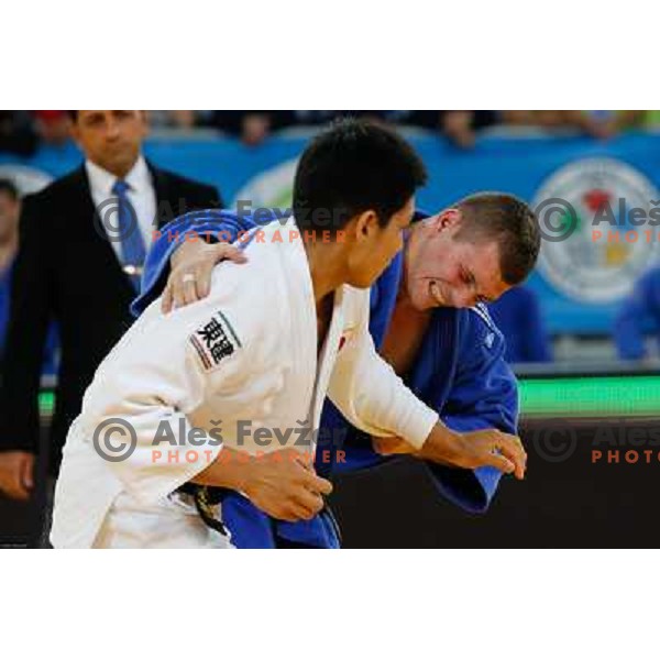 Primoz Marincic of Slovenia and Kenya Kohara of Japan in action during Judo World Championships Juniors in Arena Stozice, Ljubljana, Slovenia on October 27, 2013 