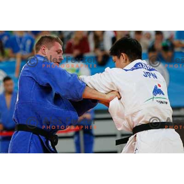 Primoz Marincic of Slovenia and Kenya Kohara of Japan in action during Judo World Championships Juniors in Arena Stozice, Ljubljana, Slovenia on October 27, 2013 