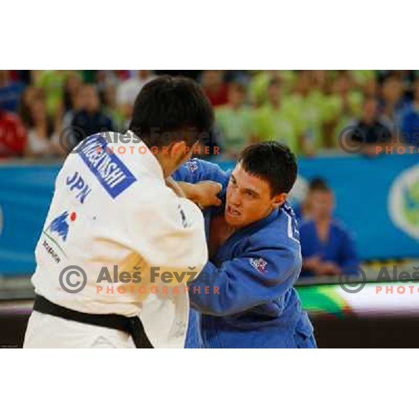 Tadej Dragic of Slovenia and Yusuke Kobayashi of Japan in action during Judo World Championships Juniors in Arena Stozice, Ljubljana, Slovenia on October 27, 2013 