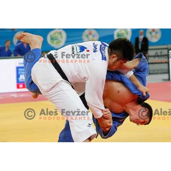 Tadej Dragic of Slovenia and Yusuke Kobayashi of Japan in action during Judo World Championships Juniors in Arena Stozice, Ljubljana, Slovenia on October 27, 2013 