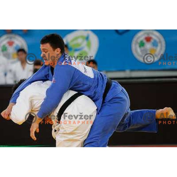 Tadej Dragic of Slovenia and Yusuke Kobayashi of Japan in action during Judo World Championships Juniors in Arena Stozice, Ljubljana, Slovenia on October 27, 2013 