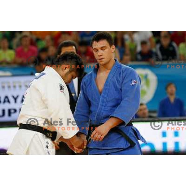 Tadej Dragic of Slovenia and Yusuke Kobayashi of Japan in action during Judo World Championships Juniors in Arena Stozice, Ljubljana, Slovenia on October 27, 2013 