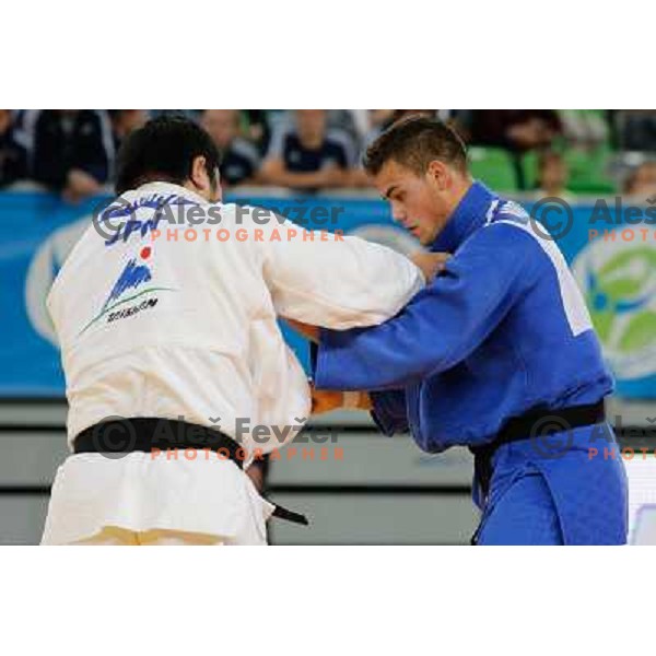Vito Dragic of Slovenia and Isao Kurahashiof Japan in action during Judo World Championships Juniors in Arena Stozice, Ljubljana, Slovenia on October 27, 2013 