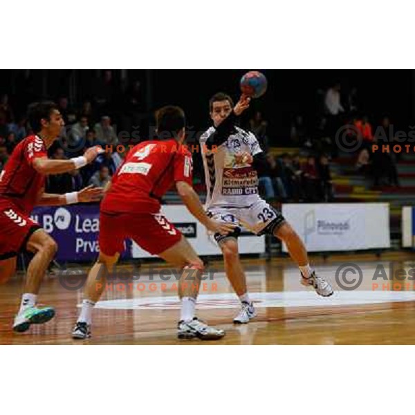 Miha Zarabec of Maribor Branik in action during handball match between RD Slovan and RK Maribor Branik, played in Kodeljevo Hall, Ljubljana, Slovenia on October 27, 2013 