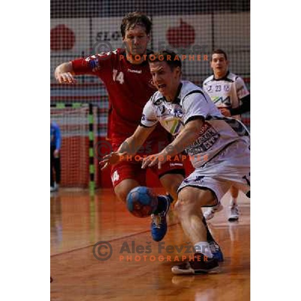 Simon Razgor of Maribor Branik in action during handball match between RD Slovan and RK Maribor Branik, played in Kodeljevo Hall, Ljubljana, Slovenia on October 27, 2013 