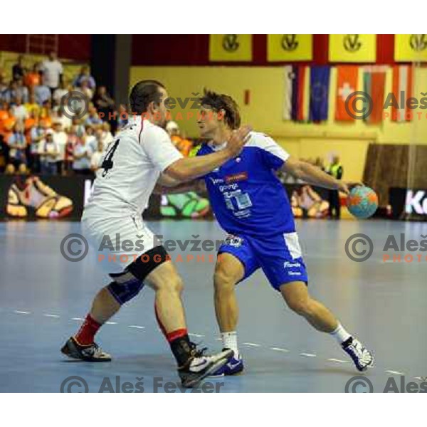 Jure Dolenec of Slovenia in action during handball match Slovenia-Switzerland in qualification for Qatar World Championships, played in Red Hall, Velenje, Slovenia on October 30 ,2013 