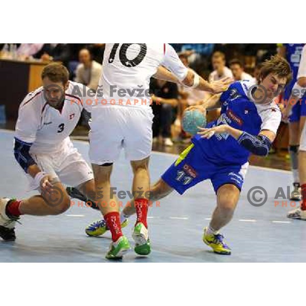 Sebastjan Skube of Slovenia in action during handball match Slovenia-Switzerland in qualification for Qatar World Championships, played in Red Hall, Velenje, Slovenia on October 30 ,2013 