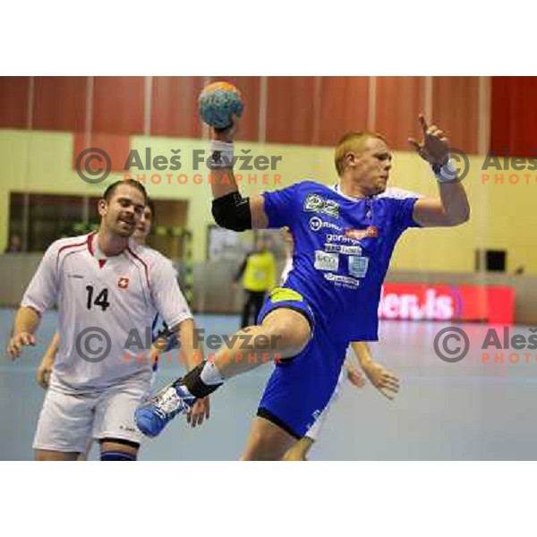 Matej Gaber of Slovenia in action during handball match Slovenia-Switzerland in qualification for Qatar World Championships, played in Red Hall, Velenje, Slovenia on October 30 ,2013 