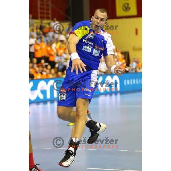Uros Bundalo of Slovenia in action during handball match Slovenia-Switzerland in qualification for Qatar World Championships, played in Red Hall, Velenje, Slovenia on October 30 ,2013 