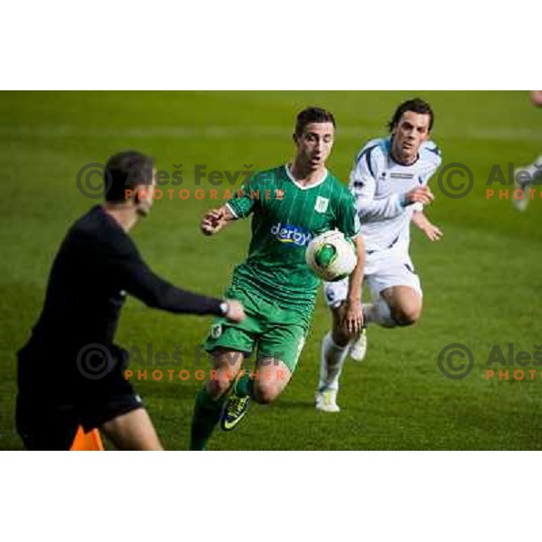 Andraz Sporar, Alessandro Favalli in action during football match Olimpija - Gorica, Round 16 of Prvaliga Telekom 2013-14 , Stozice , Ljubljana, 02.11.2013