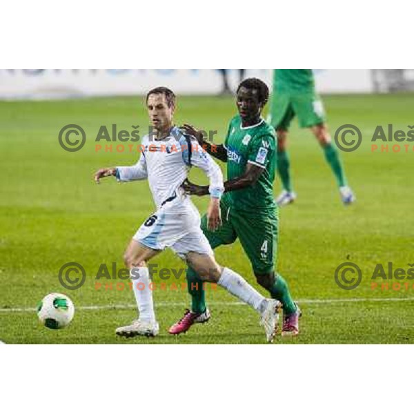Sasa Aleksander Zivec, Gabriel Eteme in action during football match Olimpija - Gorica, Round 16 of Prvaliga Telekom 2013-14 , Stozice , Ljubljana, 02.11.2013 