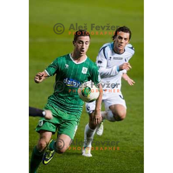 Andraz Sporar, Alessandro Favalli in action during football match Olimpija - Gorica, Round 16 of Prvaliga Telekom 2013-14 , Stozice , Ljubljana, 02.11.2013 