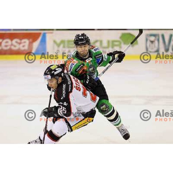 Andrej Hebar of Telemach Olimpija in action during ice-hockey match Telemach Olimpija- Orli Znojmo in round 21 of Ebel league 2013/2014, played in Hala Tivoli, Ljubljana, Slovenia on November 3,2013 