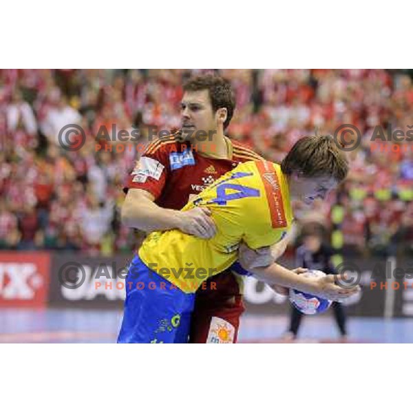 Sebastjan Skube of Celje Pivovarna Lasko in action during handball match Celje PL. -Vezsprem in EHF Champions League, played in Zlatorog Hall, Celje, Slovenia on November 17, 2013 