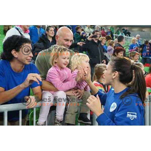 Fans of Krim Mercator meet players of Krim Mercator at handball match Krim Mercator- Leipzig in EHF Women\'s Champions league, played in Arena Stozice, Ljubljana, Slovenia on November 16, 2013 