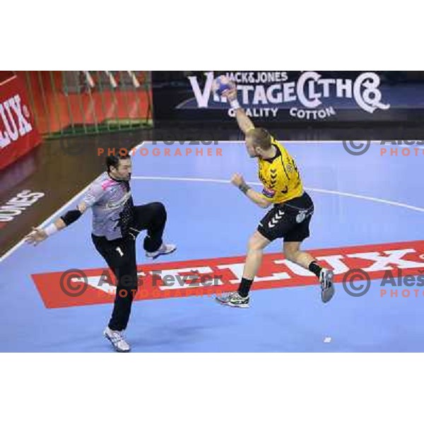 Niko Medved of Gorenje Velenje in action during EHF Champions league handball match between Gorenje Velenje ( SLO) and La Rioja (ESP) in Red hall, Velenje, Slovenia on november 23,2013 