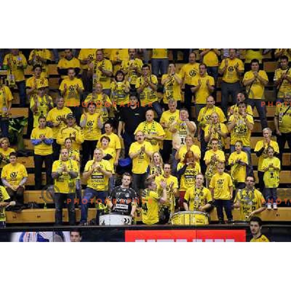 Fans of Gorenje Velenje in action during EHF Champions league handball match between Gorenje Velenje ( SLO) and La Rioja (ESP) in Red hall, Velenje, Slovenia on november 23,2013 