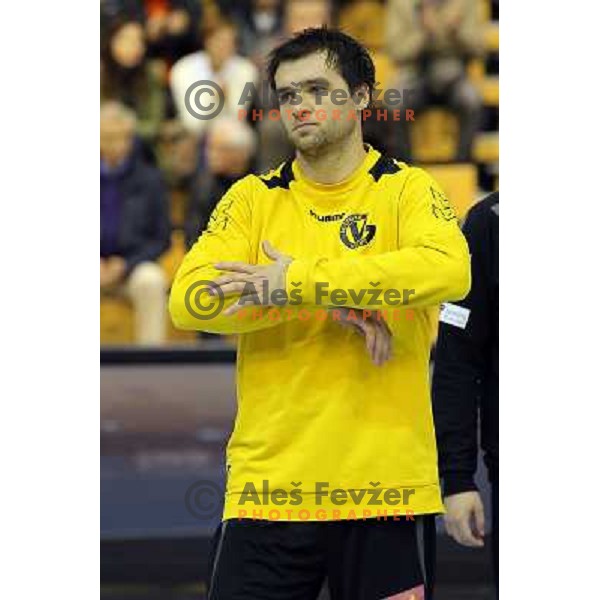 Klemen Cehte of Gorenje Velenje in action during EHF Champions league handball match between Gorenje Velenje ( SLO) and La Rioja (ESP) in Red hall, Velenje, Slovenia on november 23,2013 