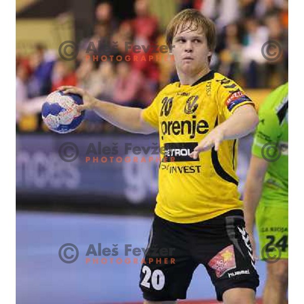 Stas Skube of Gorenje Velenje in action during EHF Champions league handball match between Gorenje Velenje ( SLO) and La Rioja (ESP) in Red hall, Velenje, Slovenia on november 23,2013 