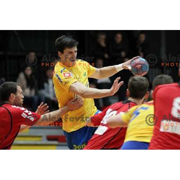 Nemanja Zelenovic of Celje Pivovarna Lasko in action during handball match Slovan - Celje PL. in 1. NLB leasing liga, played in Kodeljevo Hall, Ljubljana, Slovenia on November 27, 2013 