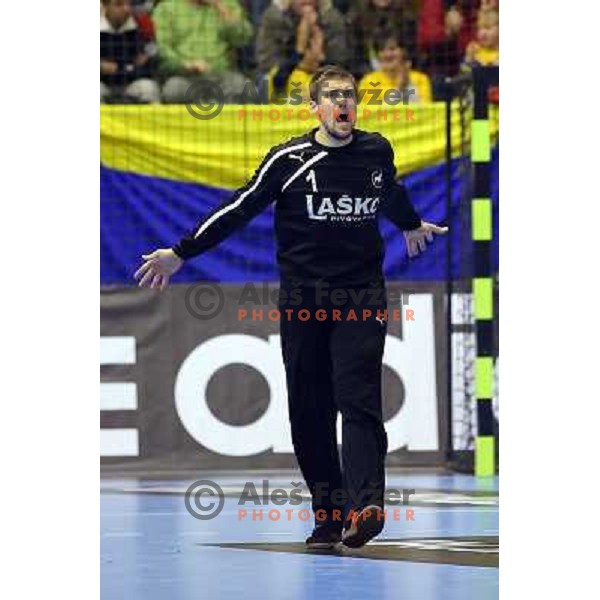 Urban Lesjak and Players of Celje Pivovarna Lasko celebrate victory at handball match Celje PL. - Zagreb CO in EHF Champions League, played in Zlatorog Hall, Celje, Slovenia on November 30, 2013 