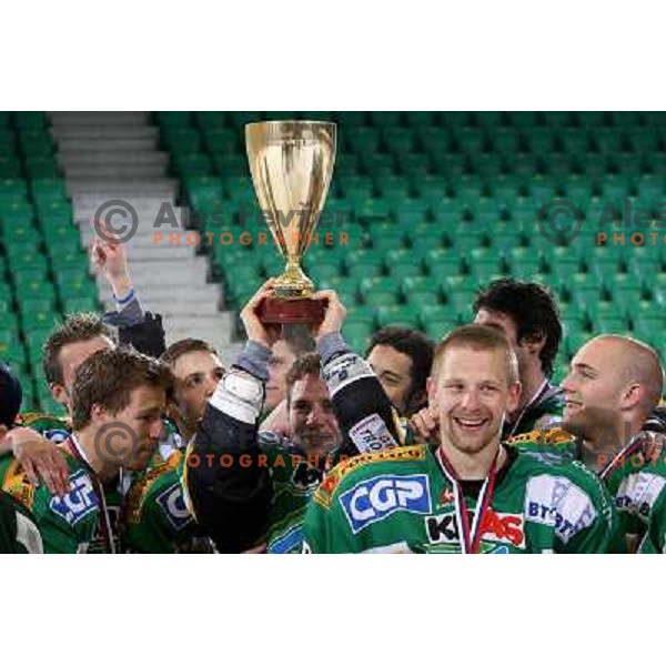 Olimpija players with the trophy after fifth game ZM Olimpija- BR Slavija in Slovenian Ice-Hockey National Finals. ZM Olimpija won after shot-out, won the series 4:1 and became Slovenian Champion