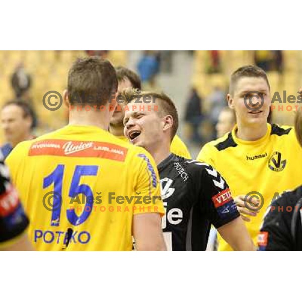 Janez Gams and Players of Gorenje Velenje celebrate victory at handball match Celje Pivovarna Lasko - Gorenje Velenje in 1.NLB leasing liga ,played in Zlatorog Hall, Celje, Slovenia on December 4, 2013 