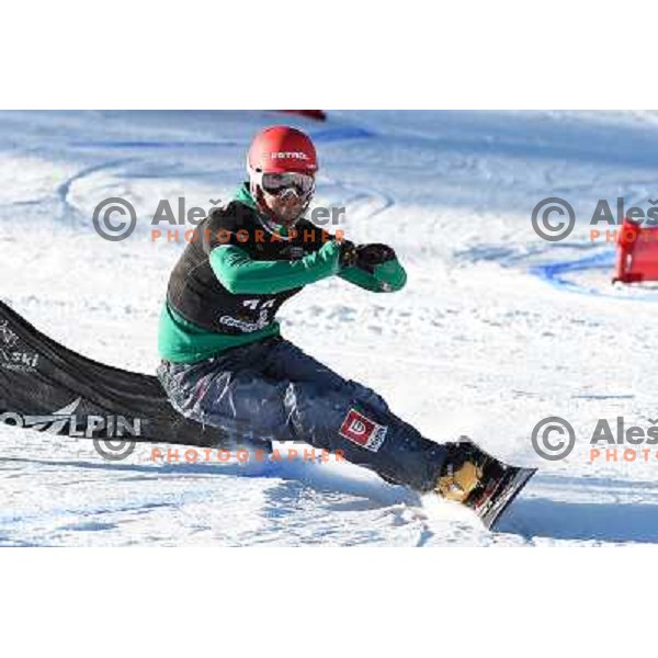 Zan Kosir of Slovenia in action during Snowboard World Cup giant slalom race in Carezza, Italy on December 14, 2013 