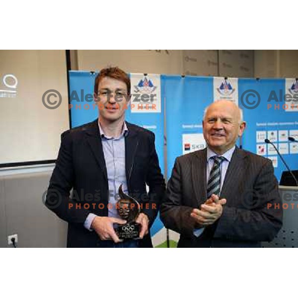 Iztok Cop received MOK award 2013 from Janez Kocijancic, president of Slovenian Olympic Committee during General Assembly of Noc of Slovenia in Ljubljana on December 17, 2013 