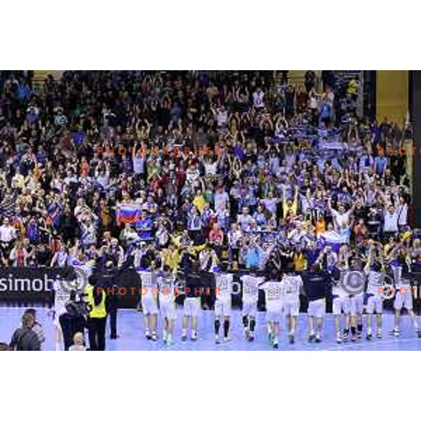 Fans and players of Slovenia in action during handball match Slovenia-Ukraine in qualification for World Championships Qatar 2015, played in Red Hall, Velenje on January 12,2014 