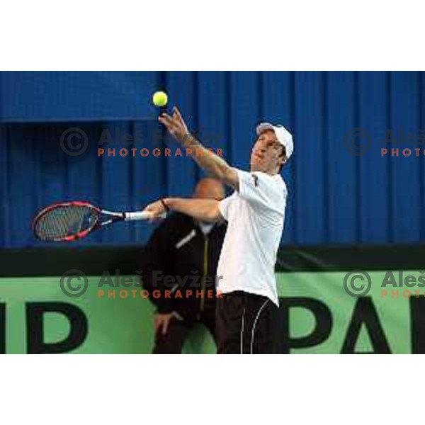 Grega Zemlja of Slovenia in action during doubles match in Davis Cup Slovenia-Portugal in Kranj, Slovenia on February 1, 2014