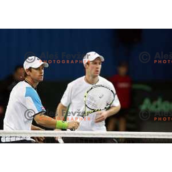 Grega Zemlja and Blaz Kavcic of Slovenia in action during doubles match in Davis Cup Slovenia-Portugal in Kranj, Slovenia on February 1, 2014