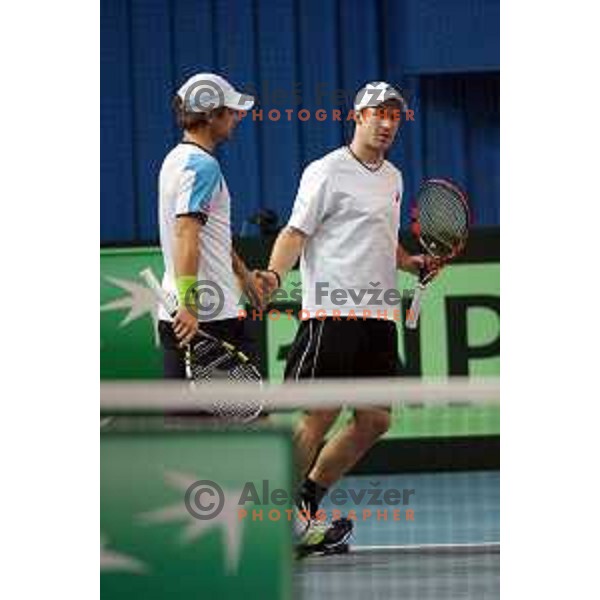 Grega Zemlja and Blaz Kavcic of Slovenia in action during doubles match in Davis Cup Slovenia-Portugal in Kranj, Slovenia on February 1, 2014