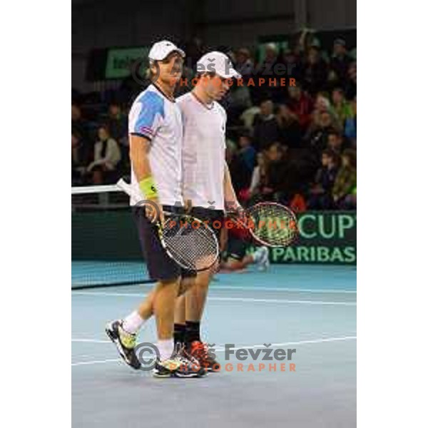Grega Zemlja and Blaz Kavcic of Slovenia in action during doubles match in Davis Cup Slovenia-Portugal in Kranj, Slovenia on February 1, 2014