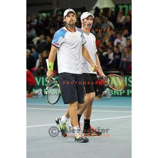 Grega Zemlja and Blaz Kavcic of Slovenia in action during doubles match in Davis Cup Slovenia-Portugal in Kranj, Slovenia on February 1, 2014