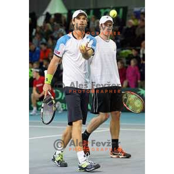 Grega Zemlja and Blaz Kavcic of Slovenia in action during doubles match in Davis Cup Slovenia-Portugal in Kranj, Slovenia on February 1, 2014