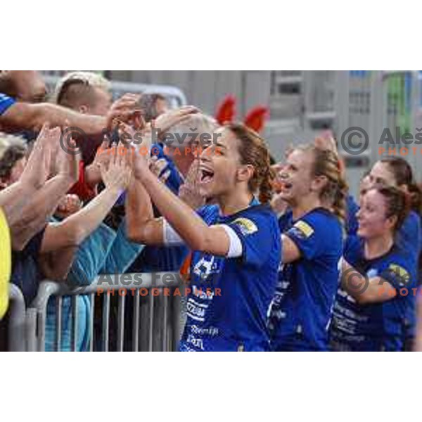 Players of Krim Mercator celebrate victory at handball match Krim Mercator (SLO) - Larvik (NOR) in EHF Women\'s Champions league, played in Arena Stozice, Ljubljana, Slovenia on February 1, 2014