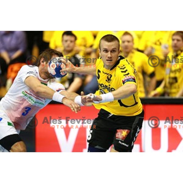 Niko Medved of Gorenje Velenje in action during handball match Gorenje Velenje (SLO)-Hamburg (GER) in EHF Champions league, played in Red Hall, Velenje, Slovenia on February 5, 2014