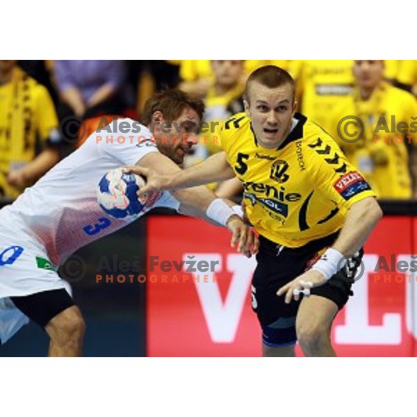 Niko Medved of Gorenje Velenje in action during handball match Gorenje Velenje (SLO)-Hamburg (GER) in EHF Champions league, played in Red Hall, Velenje, Slovenia on February 5, 2014