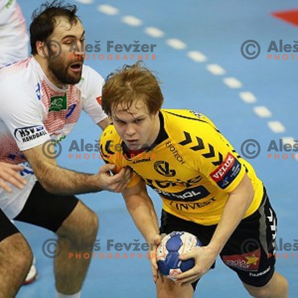 action during handball match Gorenje Velenje (SLO)-Hamburg (GER) in EHF Champions league, played in Red Hall, Velenje, Slovenia on February 5, 2014