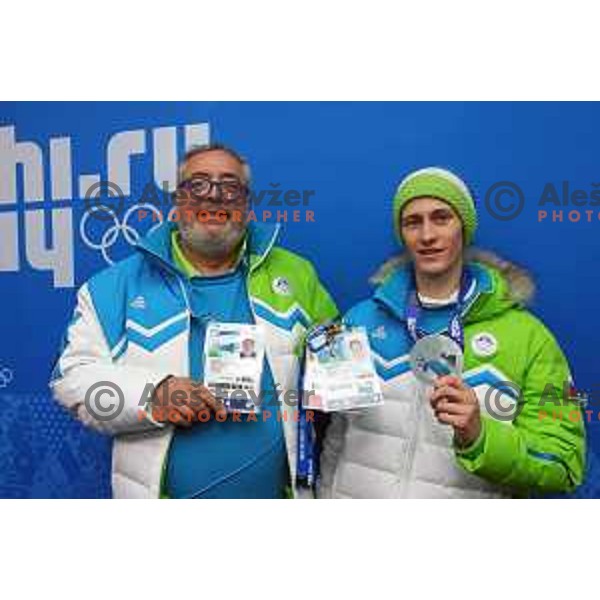 Brane Dmitrovic and Peter Prevc of Slovenia, olympic silver medalist in Ski jumping on Normal Hill at Sochi 2014 Winter Olympic Games in Olympic Park on February 10, 2014