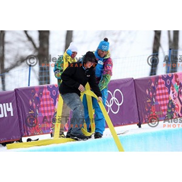 Preparation of the half-pipe before Men\'s Snowboard Half-Pipe Qualification in Extreme Park Rosa Khutor , Sochi 2014 Winter Olympic Games on February 11, 2014