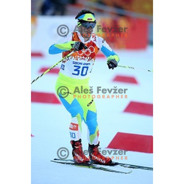 Mitja Oranic of Slovenia racing in 10 km Nordic Combined in RusSki Gorki Ski Jumping center, Sochi 2014 Winter Olympic Games on February 12, 2014