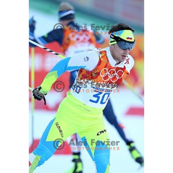Mitja Oranic of Slovenia racing in 10 km Nordic Combined in RusSki Gorki Ski Jumping center, Sochi 2014 Winter Olympic Games on February 12, 2014