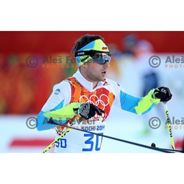 Mitja Oranic of Slovenia racing in 10 km Nordic Combined in RusSki Gorki Ski Jumping center, Sochi 2014 Winter Olympic Games on February 12, 2014