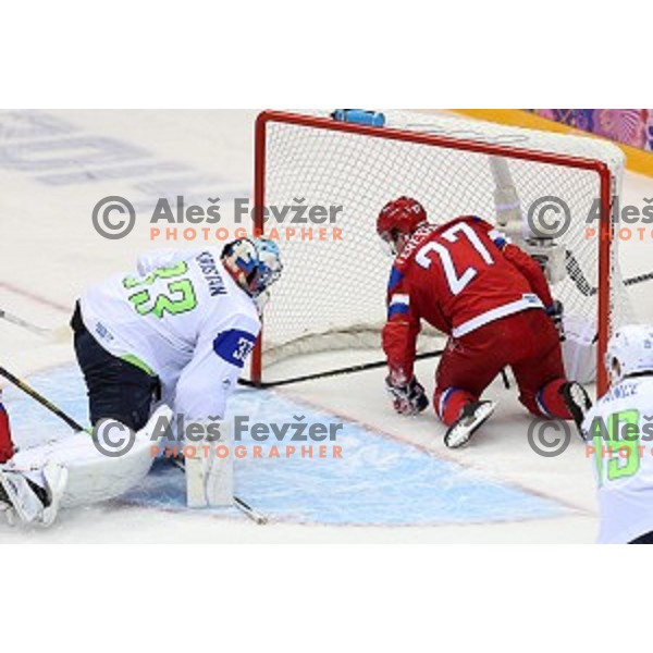 Tereshenko of Russia and Robert Kristan of Slovenia in action during Preliminary round match Russia-Slovenia at Bolshoy Ice Dome, Sochi 2014 Winter Olympic games, Russia on February 13, 2014