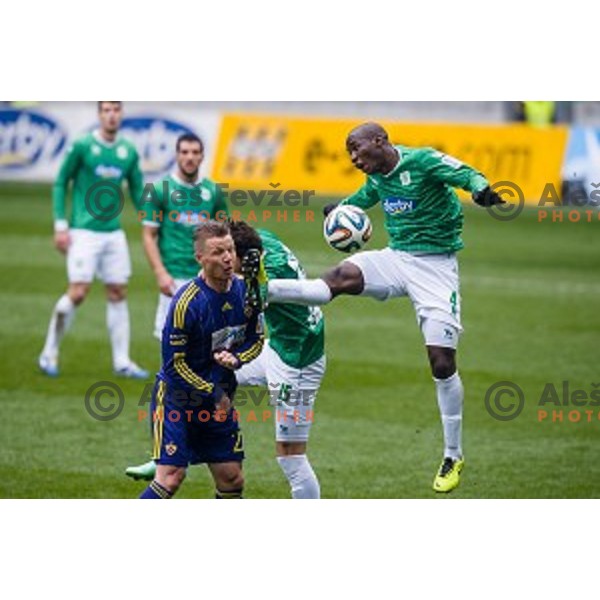 Dare Vrsic, Gabriel Eteme in action during football match Olimpija - Maribor, Round 4 of Prvaliga Telekom 2013-14 , Stozice , Ljubljana, 02.03.2014