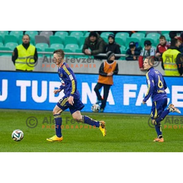Dare Vrsic, Martin Milec in action during football match Olimpija - Maribor, Round 4 of Prvaliga Telekom 2013-14 , Stozice , Ljubljana, 02.03.2014
