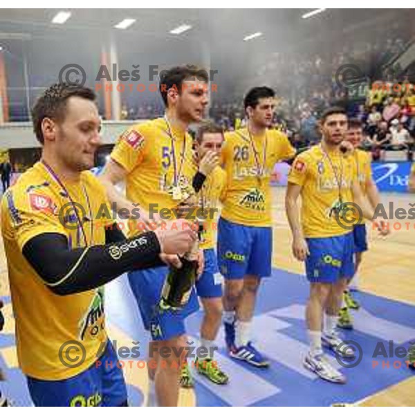 Luka Zvizej, Borut Mackovsek and Players of Celje PL celebrate victory at Slovenian Cup Final in Golovec Hall, Celje, Slovenia on March 2, 2014