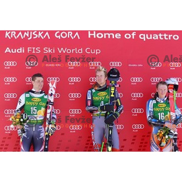 Benjamin Raich (AUT, 2 place), Ted Ligety (USA, winner) Henrik Kristoffersen (NOR, 3 place) at AUDI FIS Ski World Cup Giant Slalom for 53.Vitranc Cup in Kranjska gora, Slovenia on March 8, 2014